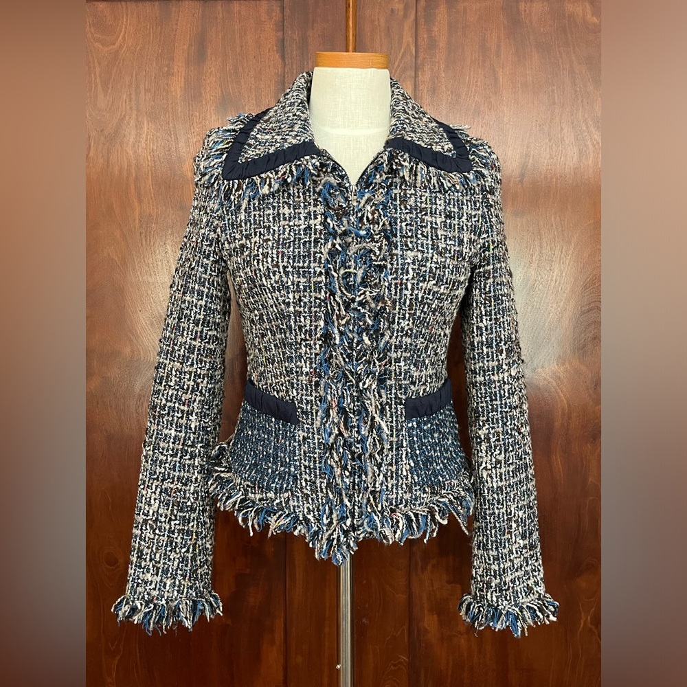 Great tweed jacket with fringe  to wear with dress slacks or jeans.